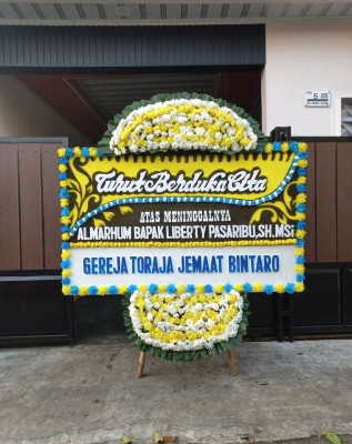 Papan Bunga Duka di Babakan